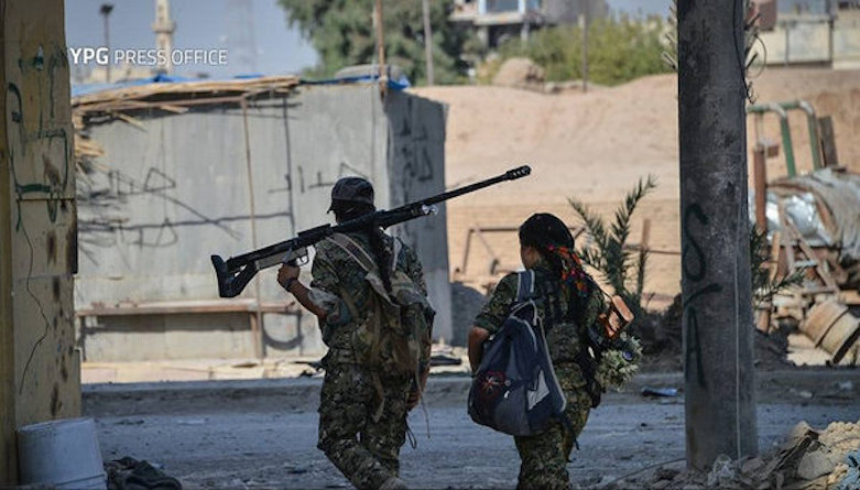 Women's Defense Units (YPJ) snipers walk to deploy to their positions against IS in Raqqa, August 8, 2017. (Photo: YPG Press office)